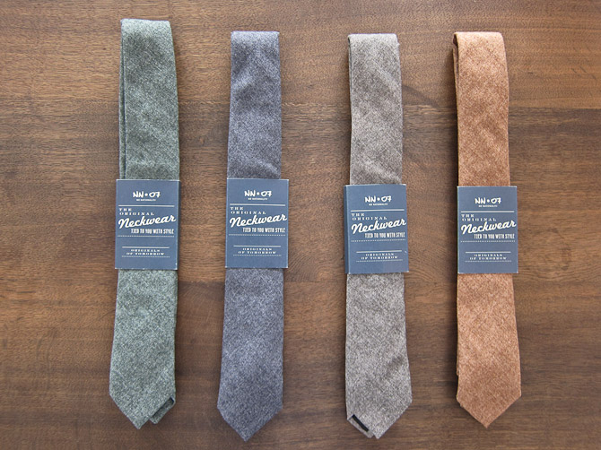 Fire uldne bud på et slips fra NN07